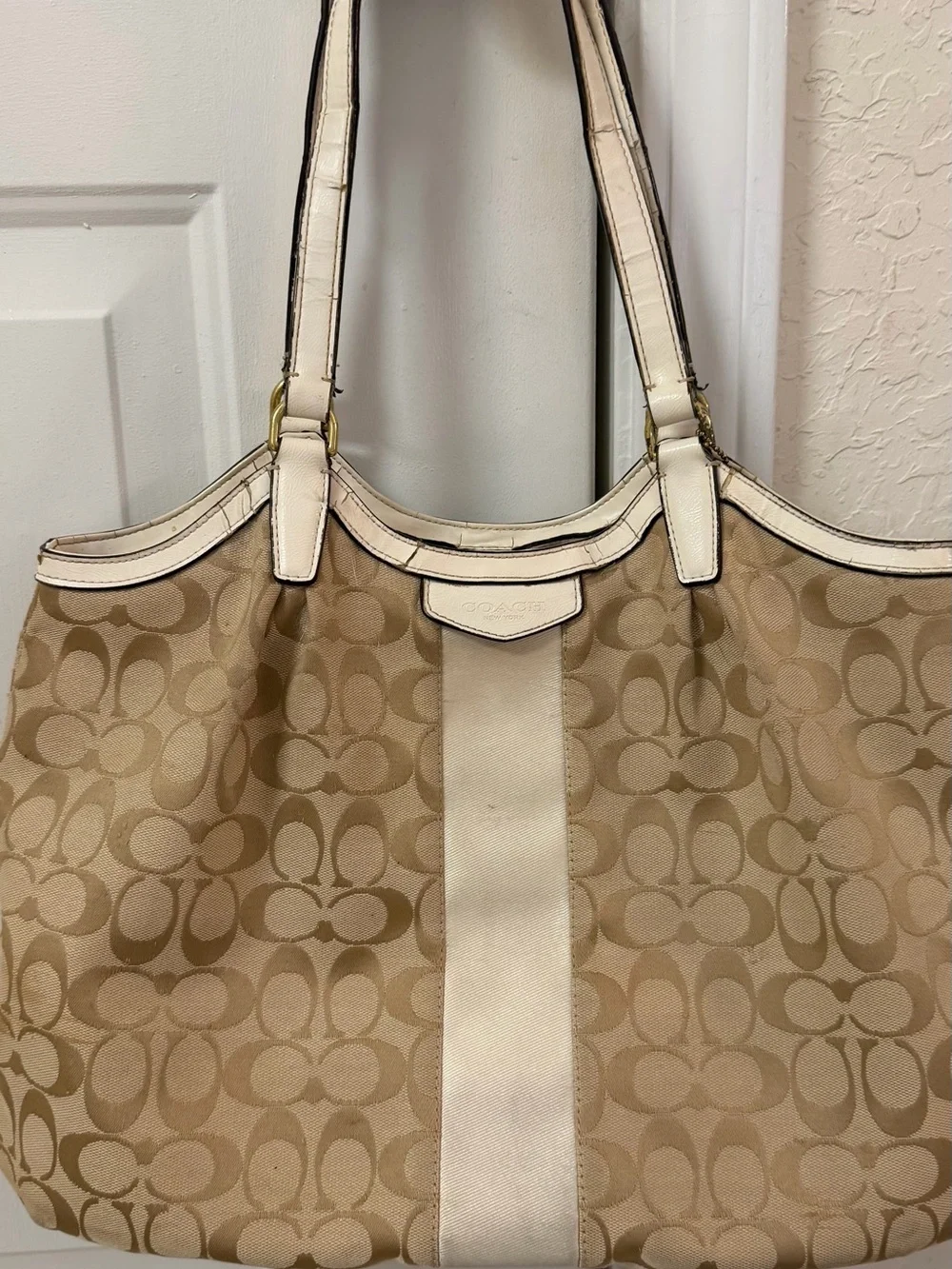 Coach Signature Canvas Beige Tote Bag with Ivory Trim handles are cracked!
